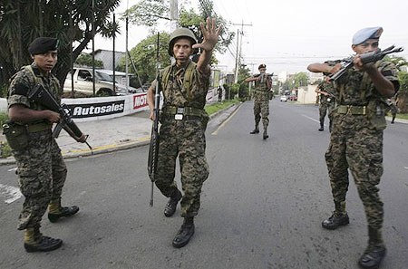 Honduran soldiers block a street near the residence of Honduras' President Manuel Zelaya in Tegucigalpa June 28, 2009.